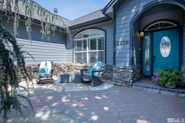 obstructed view of property featuring a garage