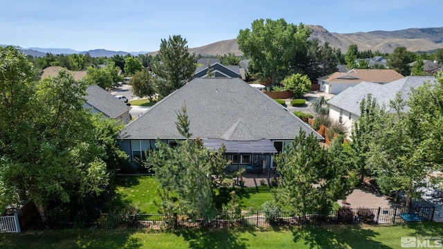 drone / aerial view featuring a mountain view