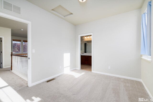 bathroom with vanity, an inviting chandelier, toilet, and tile patterned floors