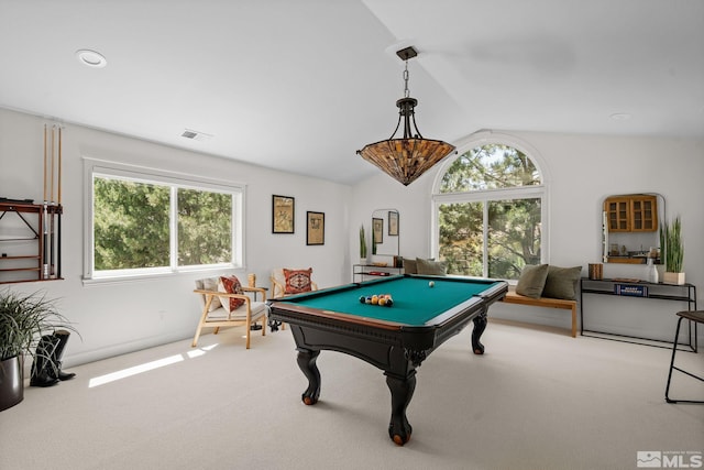 rec room with light carpet, vaulted ceiling, billiards, and plenty of natural light