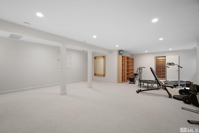 workout room with light colored carpet