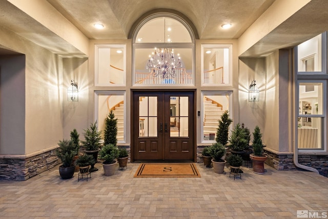 entrance to property featuring french doors