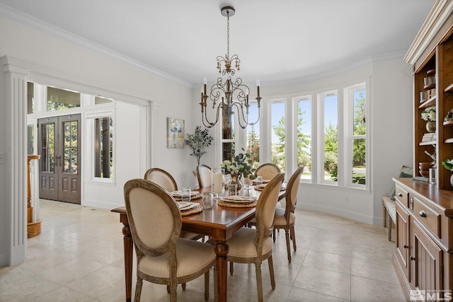 tiled dining area with an inviting chandelier, crown molding, french doors, and a healthy amount of sunlight