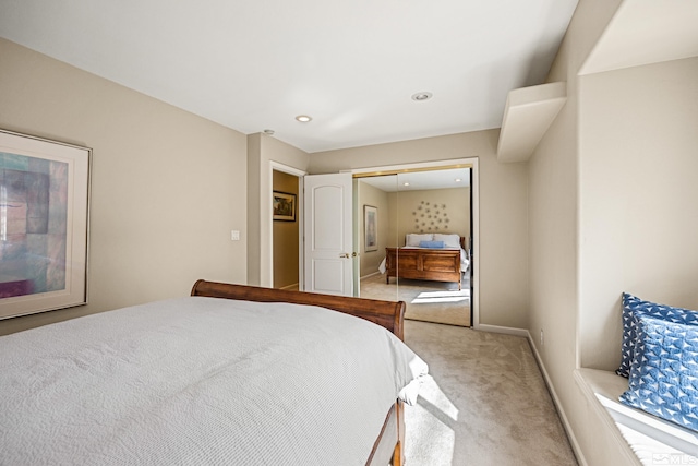 carpeted bedroom featuring a closet