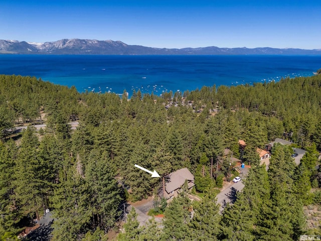 bird's eye view featuring a water and mountain view