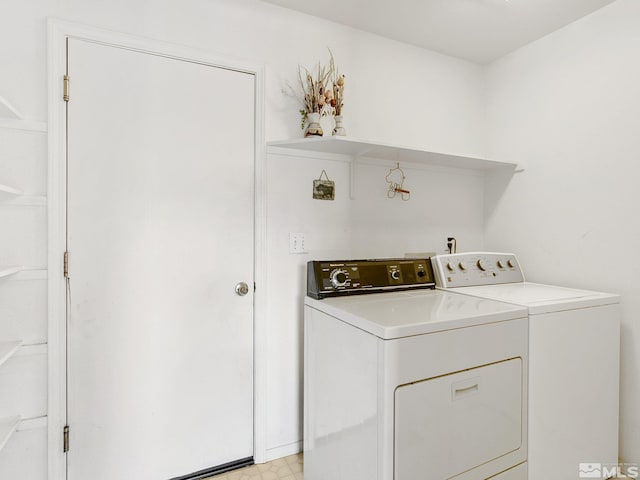 laundry room with laundry area and separate washer and dryer