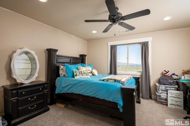 carpeted bedroom featuring ceiling fan