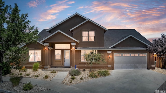 view of front of property with a garage