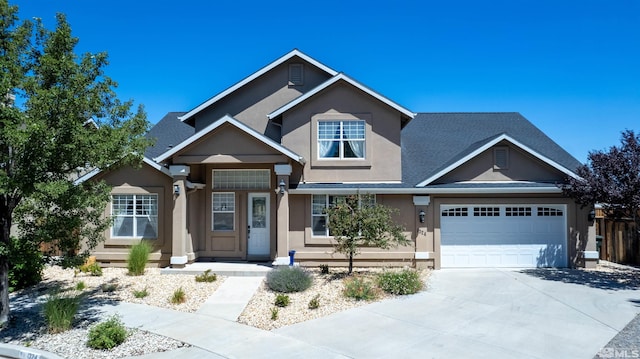 craftsman house with a garage