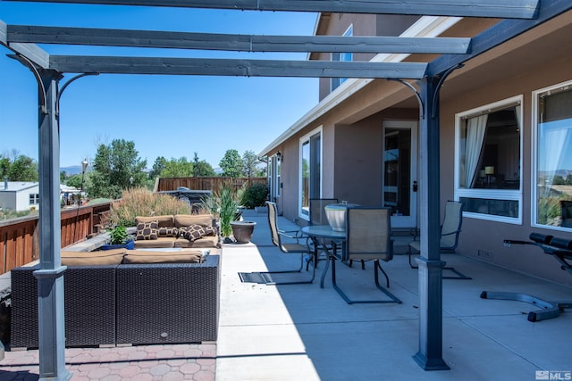 view of patio / terrace with an outdoor hangout area and a pergola