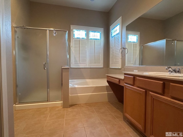 bathroom with vanity, separate shower and tub, and tile patterned flooring