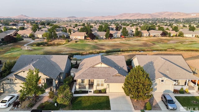 drone / aerial view featuring a mountain view