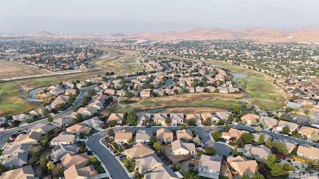 drone / aerial view featuring a mountain view