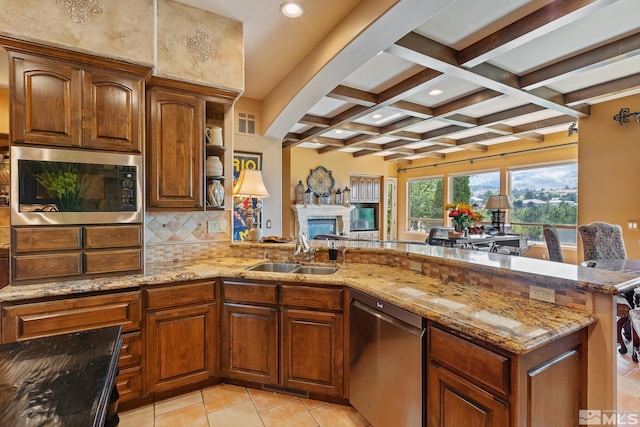 kitchen with stainless steel dishwasher, decorative backsplash, beamed ceiling, coffered ceiling, and black microwave