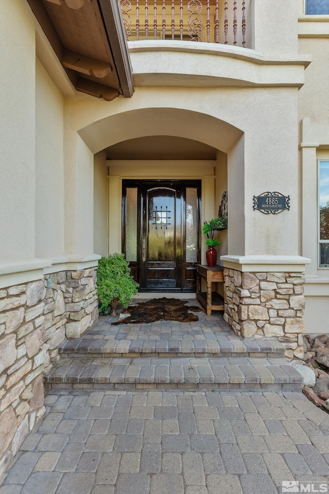 property entrance featuring french doors