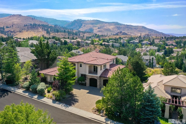 drone / aerial view featuring a mountain view