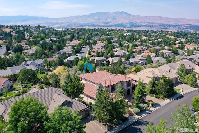 drone / aerial view featuring a mountain view