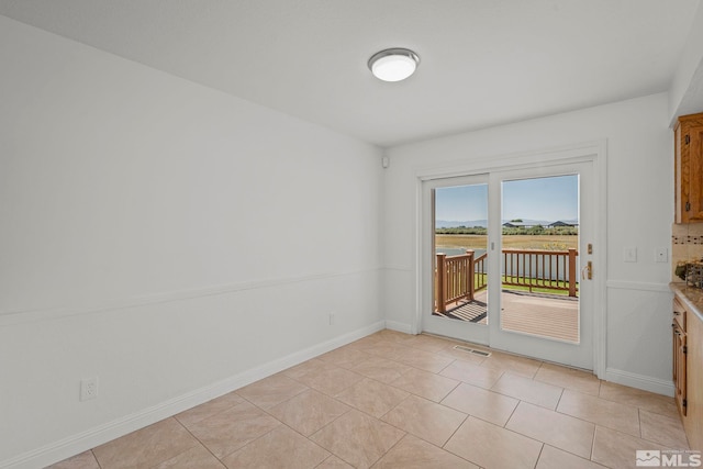 view of tiled spare room