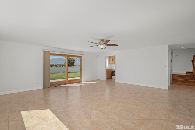 unfurnished living room with ceiling fan and light tile patterned floors