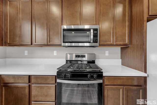 kitchen with range with gas cooktop