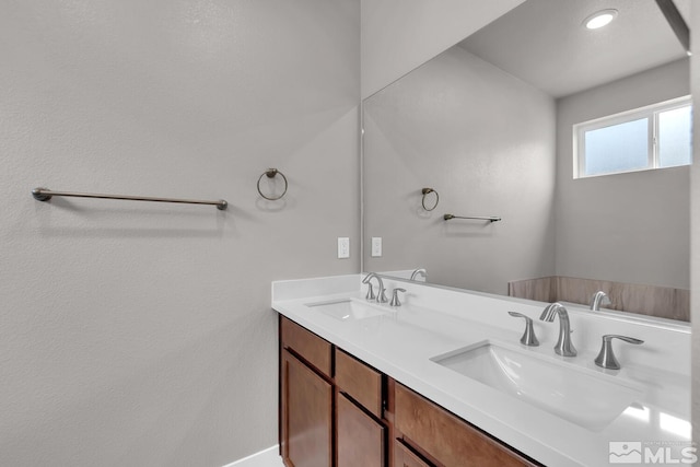 bathroom featuring vanity