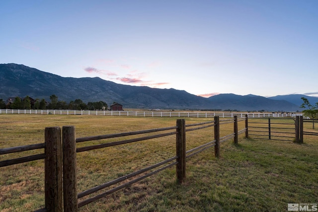 view of mountain feature featuring a rural view