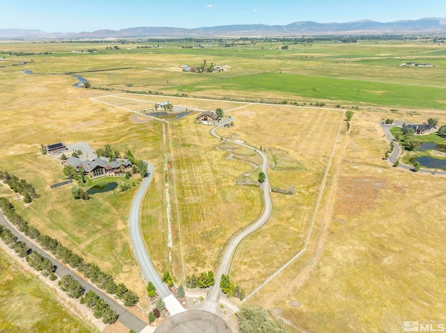 aerial view with a mountain view and a rural view