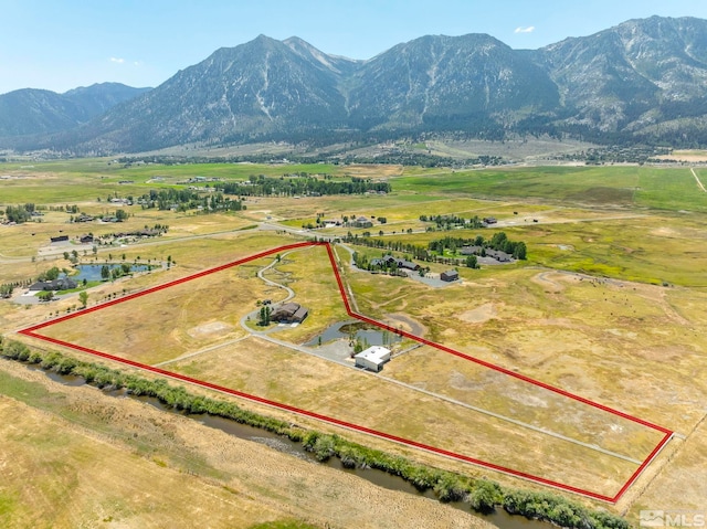 aerial view featuring a mountain view and a rural view