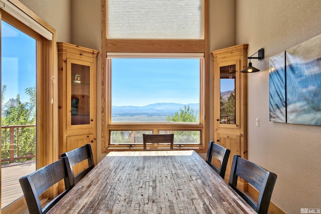 dining room with a mountain view