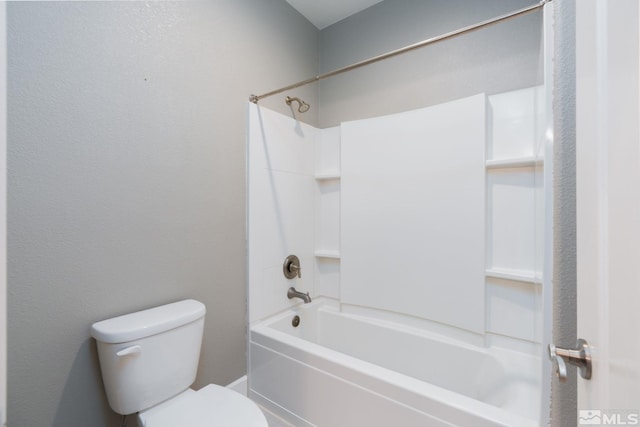 bathroom with toilet and tub / shower combination