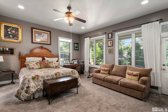 carpeted bedroom with access to exterior and ceiling fan