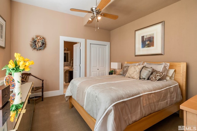 carpeted bedroom with connected bathroom, a closet, and ceiling fan