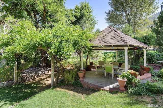 view of yard with a gazebo and a patio