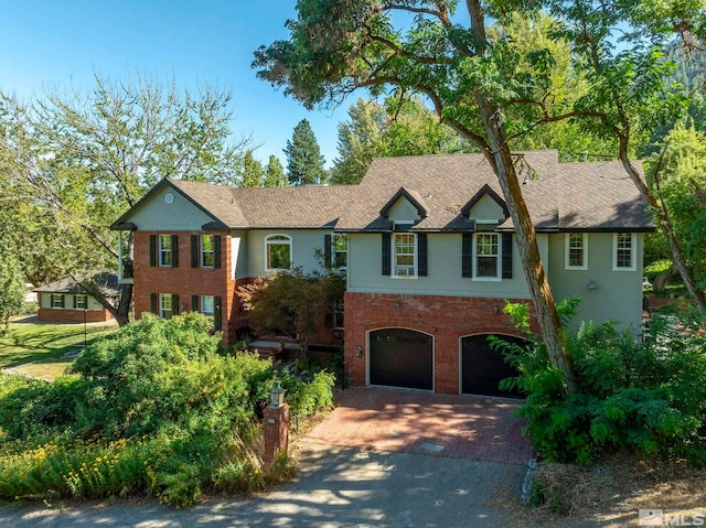 view of front of home with a garage