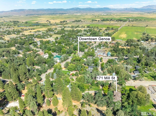 drone / aerial view featuring a mountain view