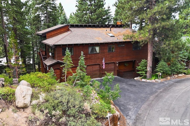 view of front of home with a garage