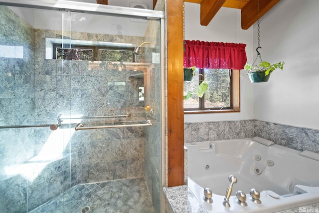 bathroom with beamed ceiling and a shower with door