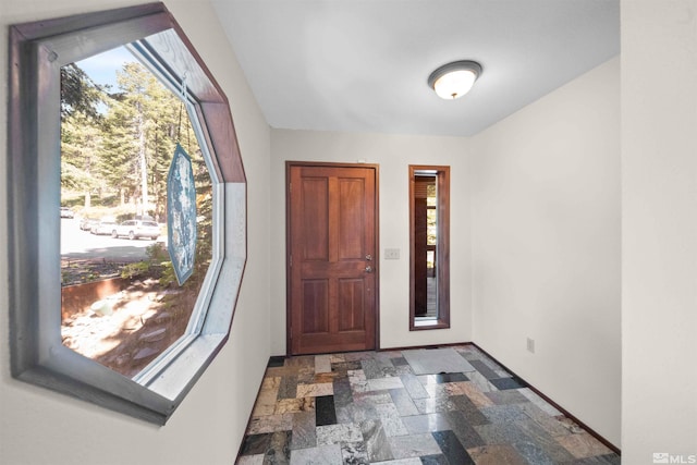 entrance foyer featuring tile patterned flooring