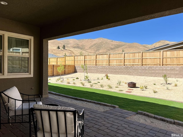 view of patio featuring a mountain view