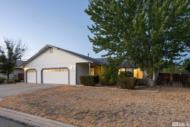 ranch-style house featuring a garage