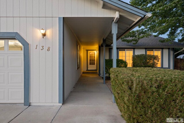 property entrance featuring a garage