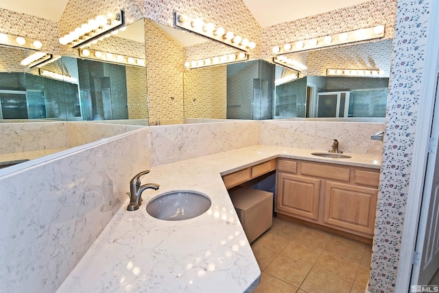 bathroom featuring vanity and tile patterned flooring