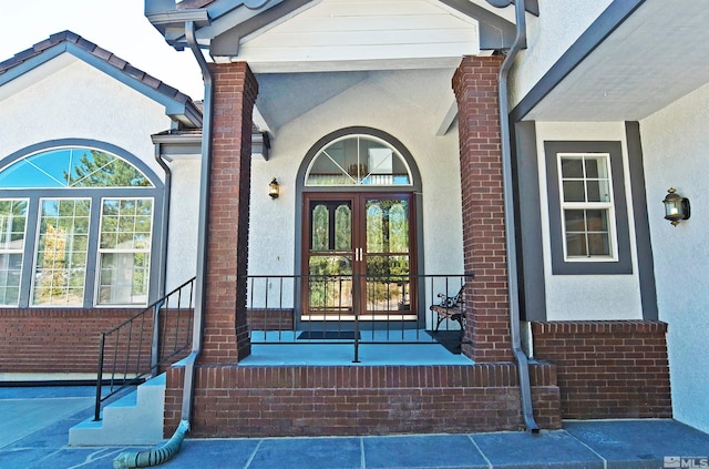 doorway to property with french doors