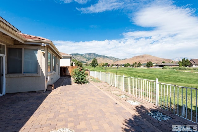 view of patio / terrace with a mountain view