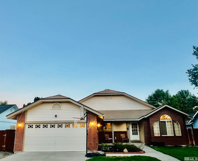 single story home featuring a garage