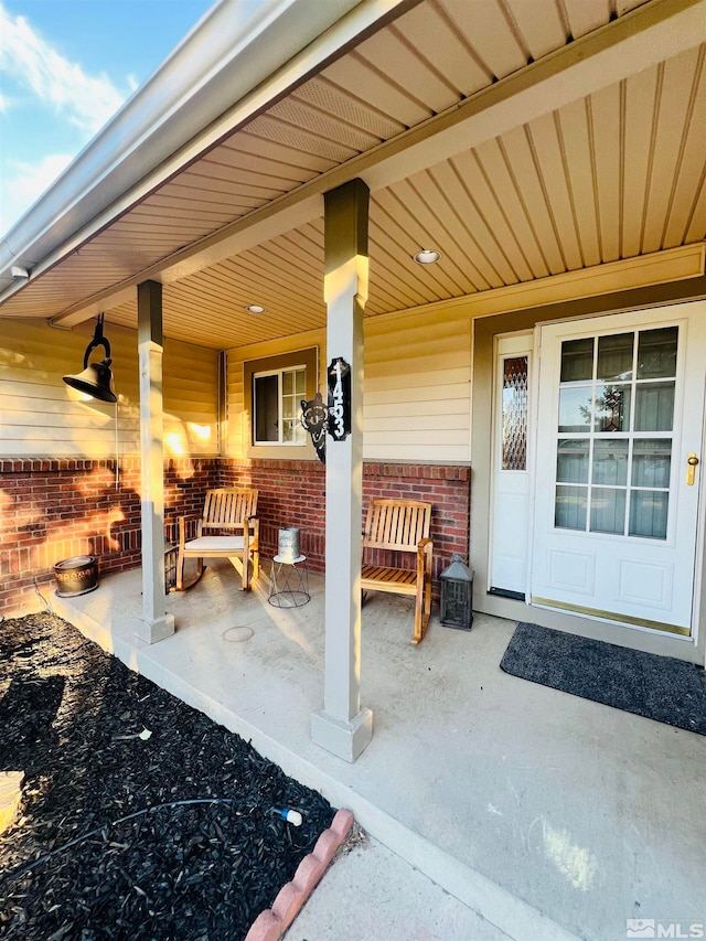 property entrance with a porch