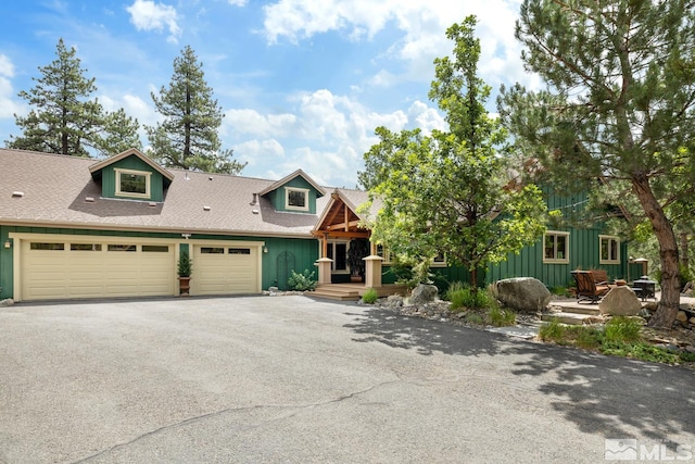 view of front of property with a garage