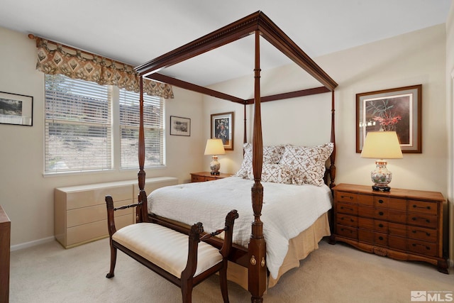 bedroom featuring light colored carpet