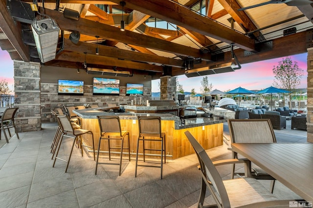 view of patio / terrace with an outdoor bar, a gazebo, and area for grilling