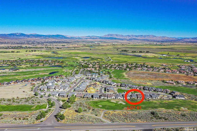 bird's eye view with a mountain view